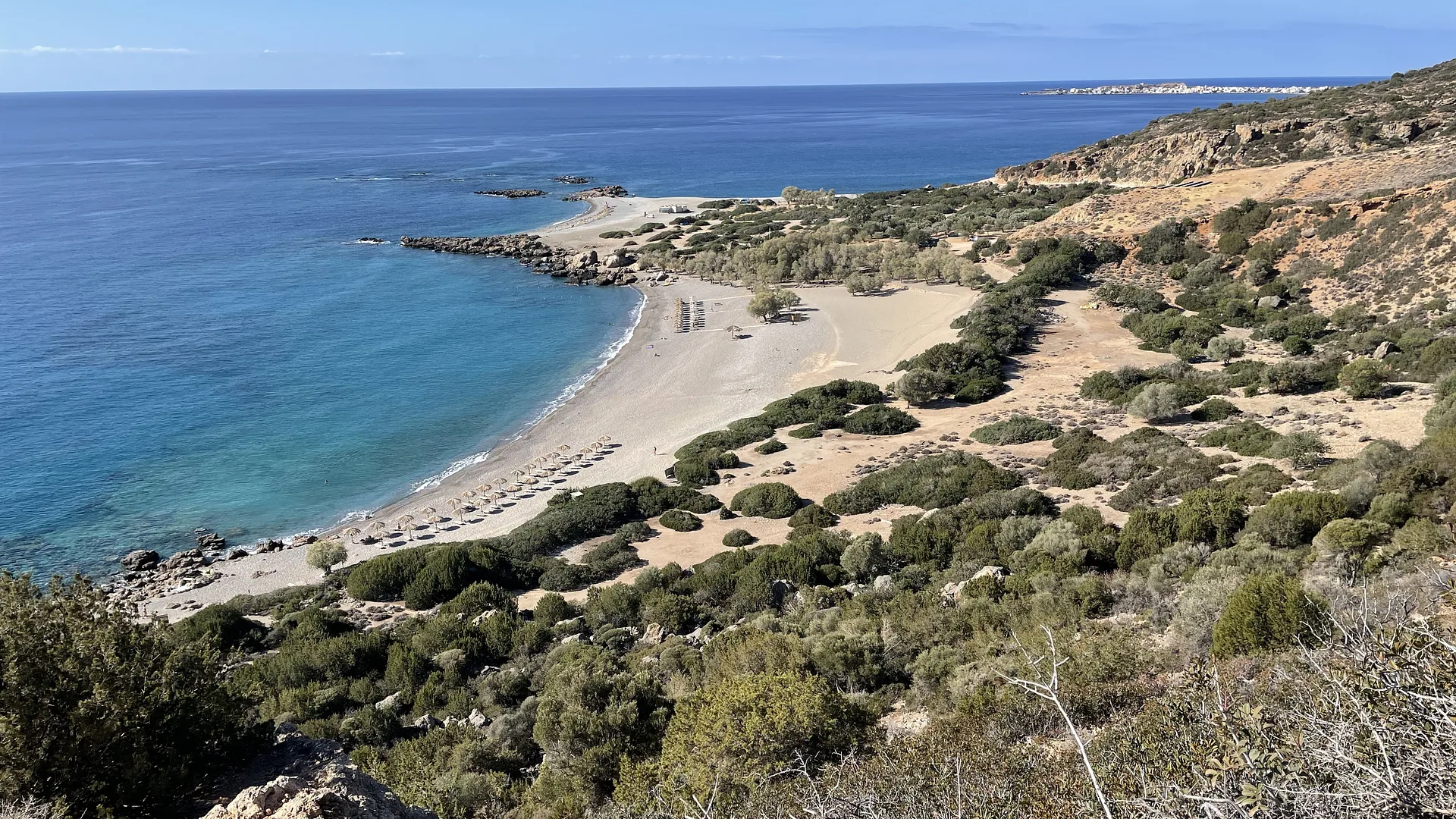 Panoramic view of the twin beaches of Gialiskari surrounded by wild Mediterranean vegetation